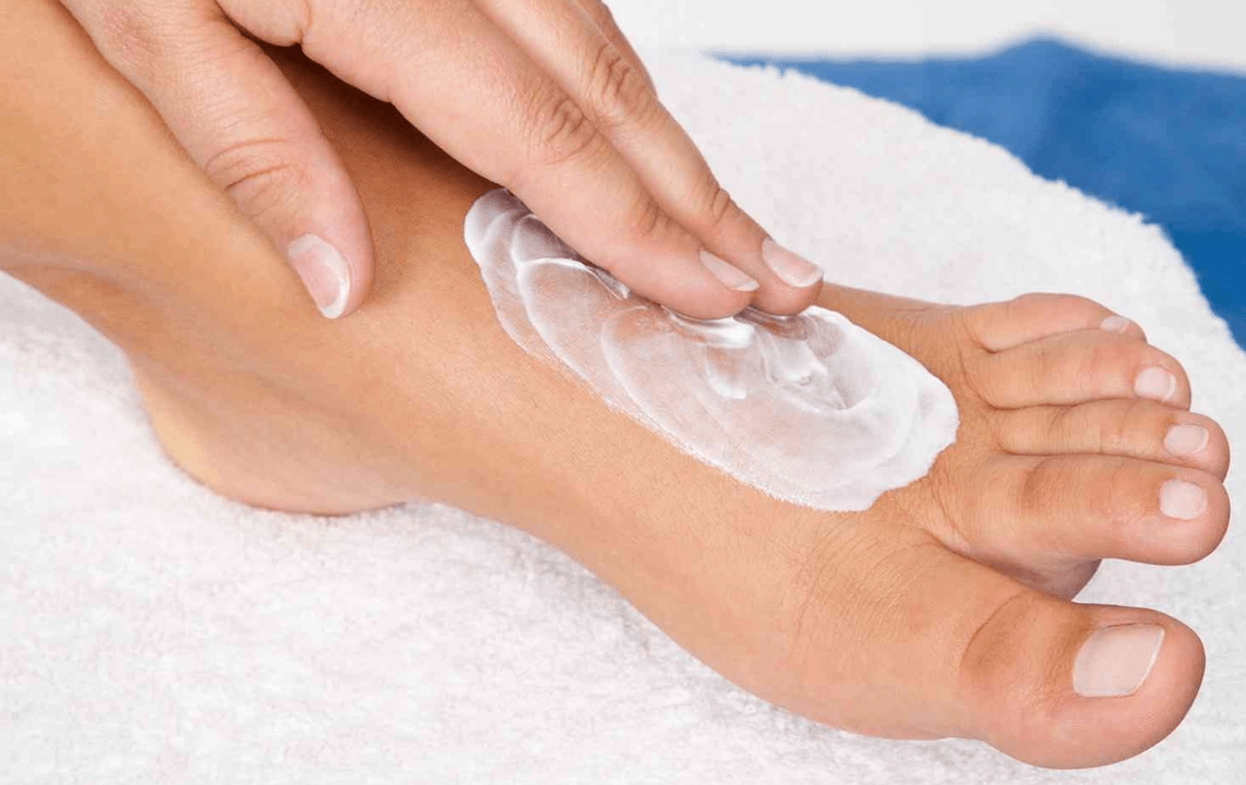 Apply antifungal ointment to feet